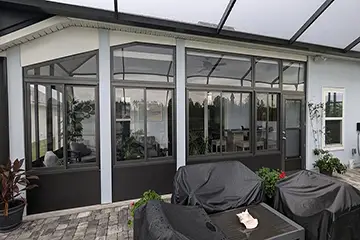 Florida room with bronze acrylic windows